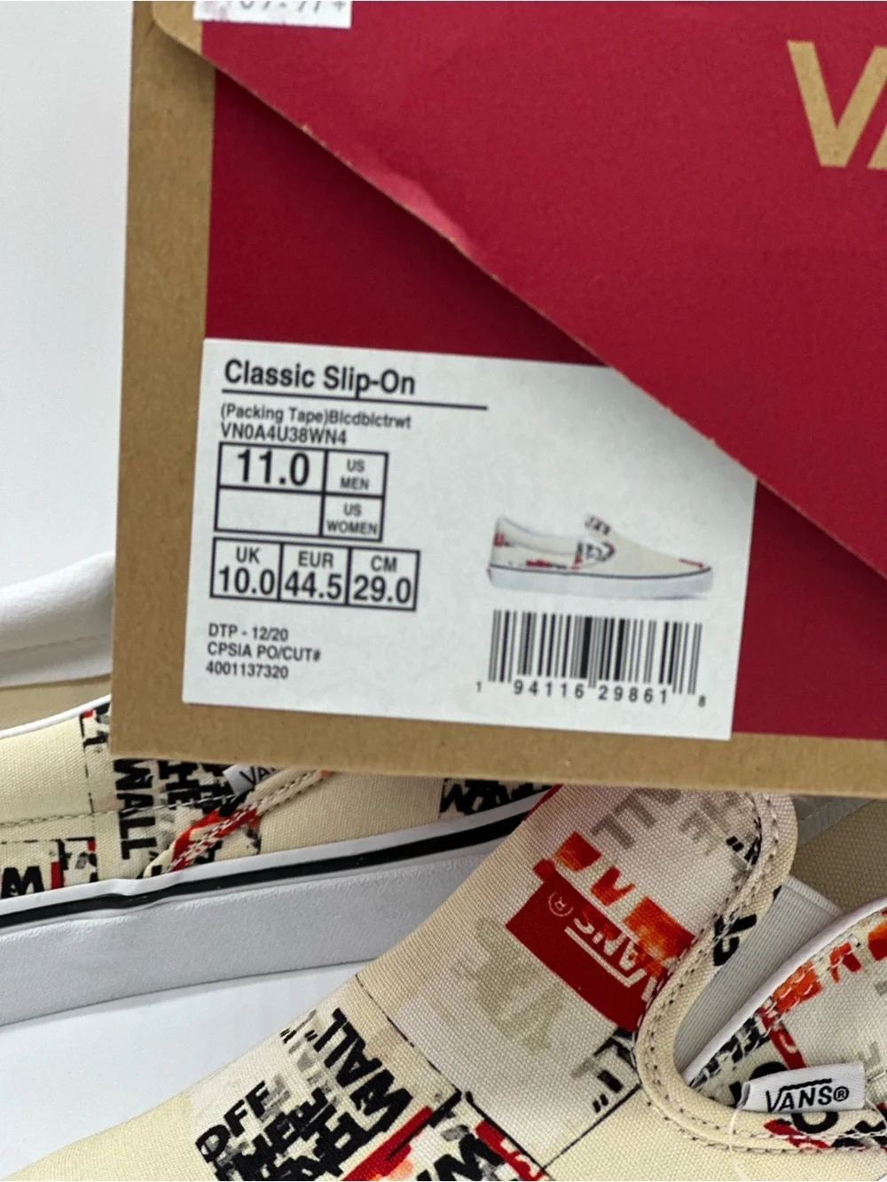 Vans Slip-On Sneakers in Cream, Red & Black Graphic Print